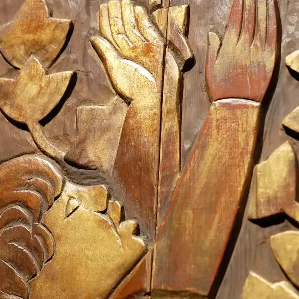 A detail image of a wood carving.