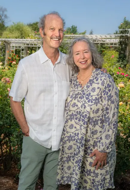 couple standing in Rose Garden
