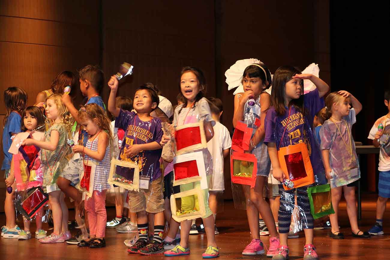 Explorers campers performing on stage