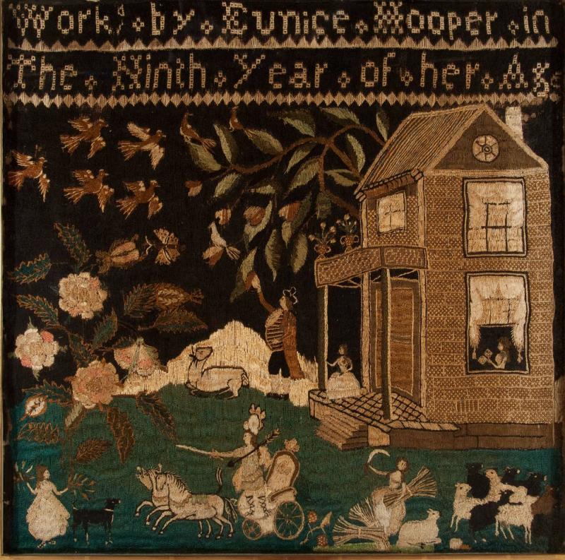 Embroidery of brick house with woman reading in window, figures, horses and carriage, sheep, dog, and ox against dark background with foliage and birds; name and age of maker above.