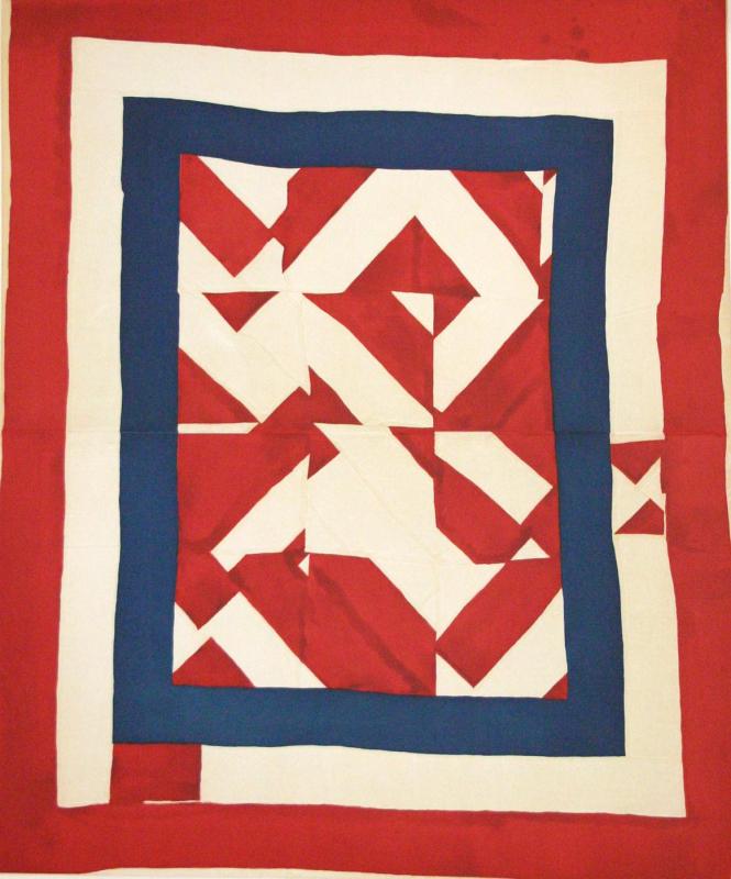 Print on paper showing a red rectangular border around a cream and navy rectangular border surrounding an abstract arrangement of red block shapes. 