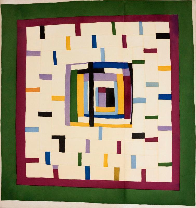 Print on paper showing a green square border around a maroon square border, surrounding irregular arrangements of multicolor rectangles.