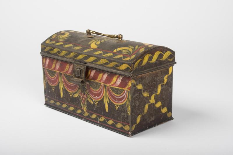 Painted tin document box mounted with original brass handle; decorated with red, white and yellow on three sides and the top; typical of the workshop of Elijah and Elisha North.