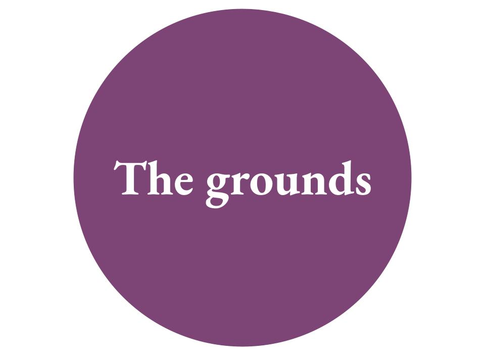 The text The Grounds inside a purple circle. 