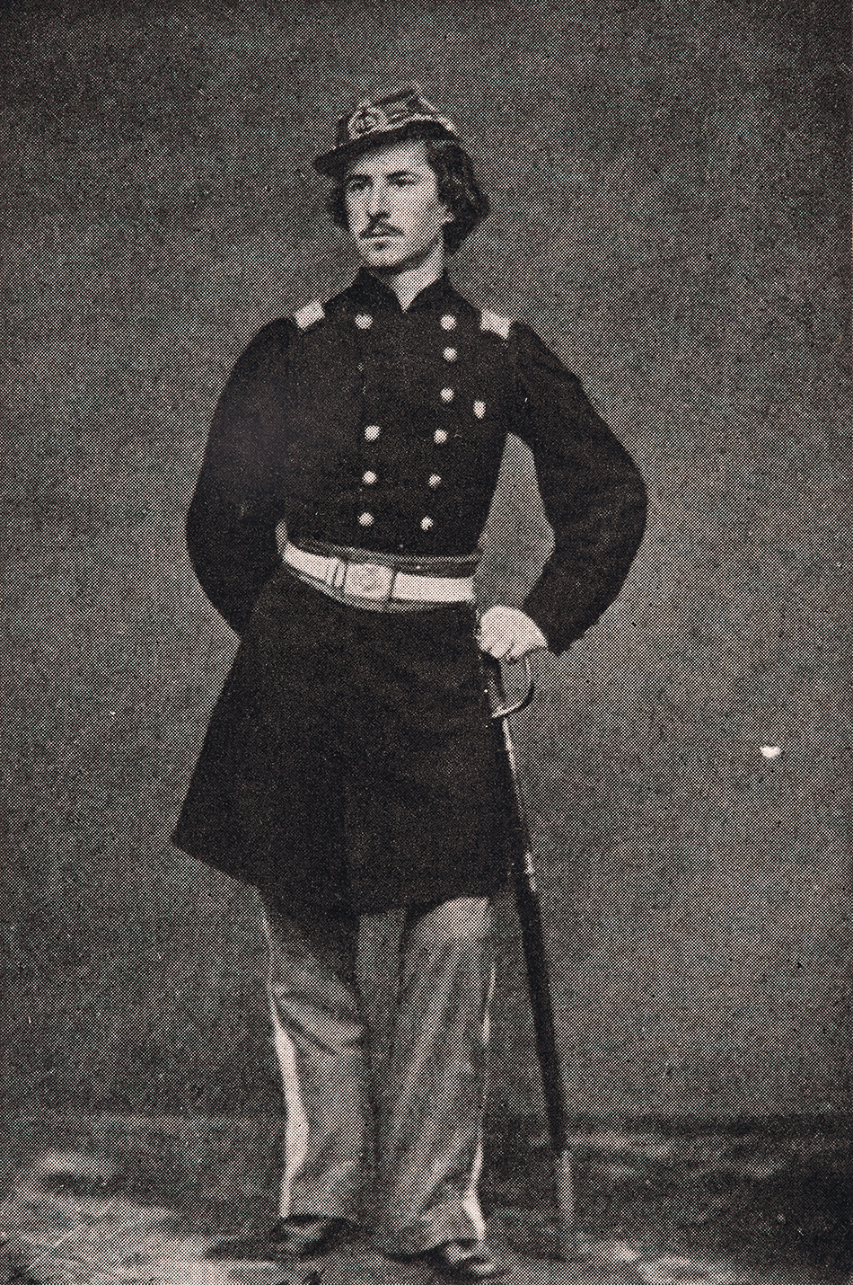 Col. E. E. Ellsworth wearing his Union Army uniform and standing with his sword