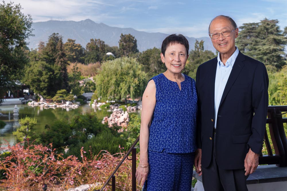 June and Simon Li stand overlooking the Chinese Garden.