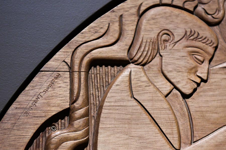 A close-up view of a wooden artwork.