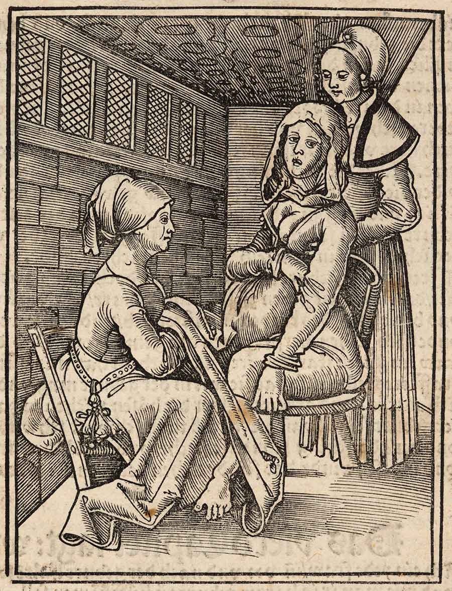Illustration of a woman giving birth, assisted by two midwives, from Eucharius Rösslin’s Der swangern Frauwen und hebammen Rosegarten, 1513.