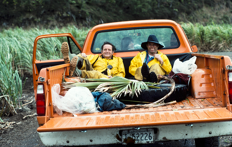 John Sincock, left, and Mike Scott in the back of a pickup truck
