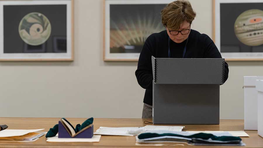 Olga Tsapina, the Norris Foundation Curator of American History at The Huntington, delves into the Shugart materials. Photograph by Aric Allen.