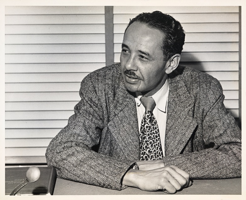 Loren Miller, seated at desk, ca. 1950. Unknown photographer. Loren Miller Collection. The Huntington Library, Art Museum, and Botanical Gardens