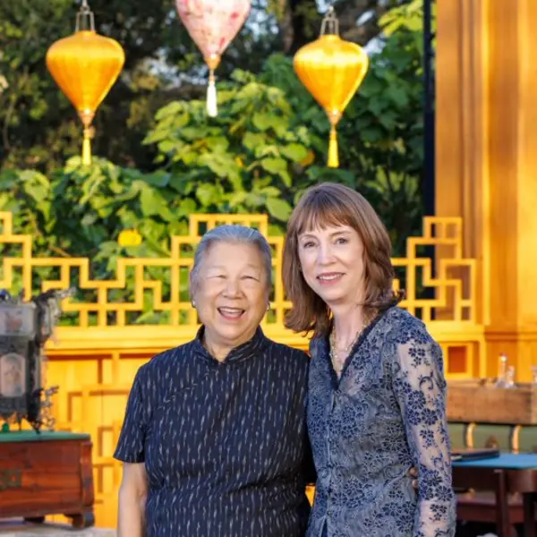 Two women under Chinese lanterns.