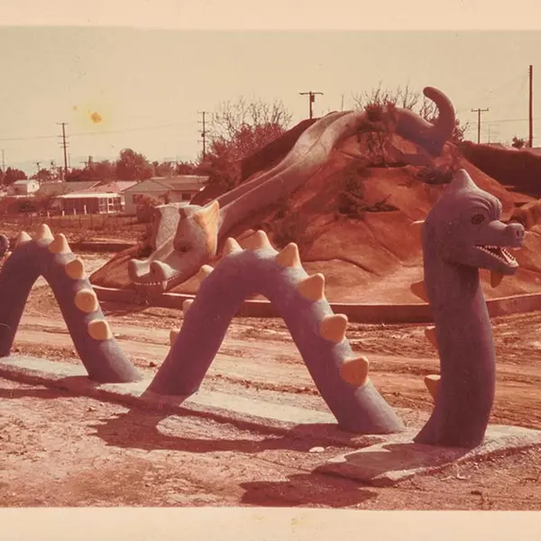 A faded 1980s photograph of play structures at a park.