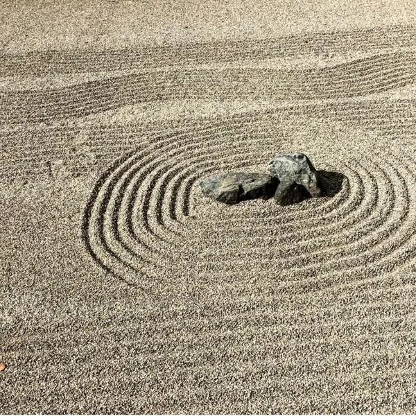 Lined sand in a meditation garden.