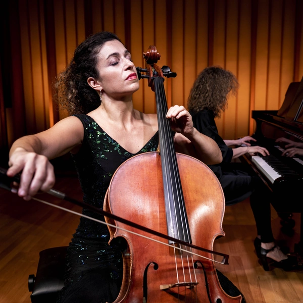 A musician playing a cello.