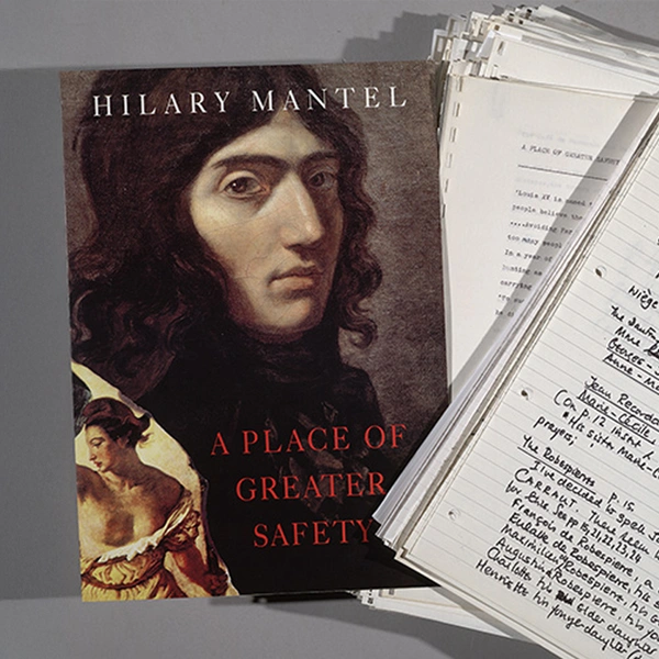 On left, a book cover with a painting of a person with long dark hair; On right, lined paper with handwritten notes.