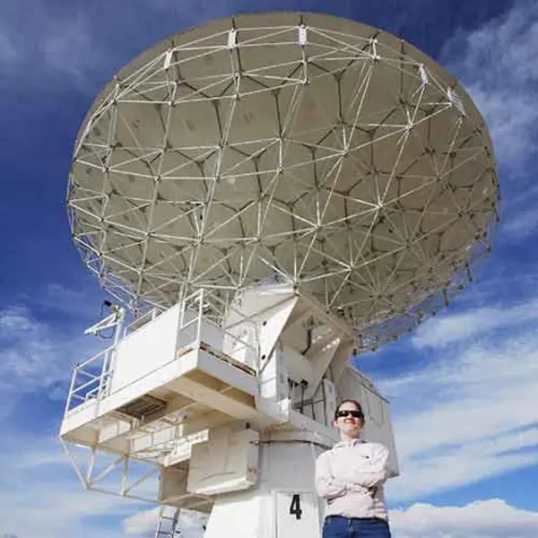 Astronomer Katherine Alatalo in front of satellite 