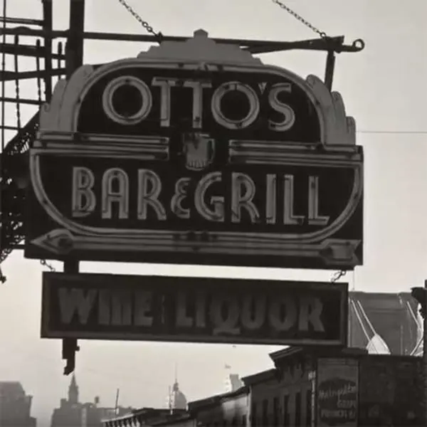 black and white photo of Ottos Bar and Grill sign