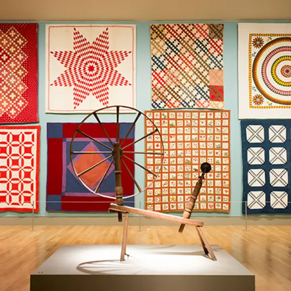 Quilts and spinning wheel in the fielding wing