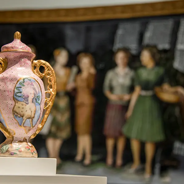 The Three Graces and Marie Antoinette, a new porcelain and enamel vessel by Juliana Wisdom, sits atop a pedestal