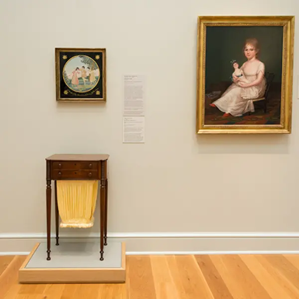 View of gallery with lady's work table