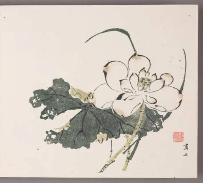 Woodblock print featuring a white lotus flower with big white petals and big green leaves. 