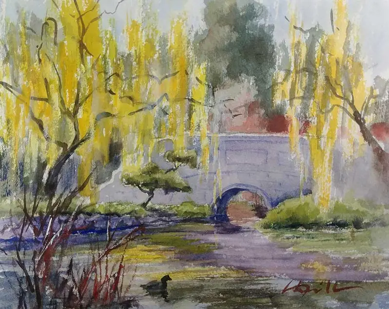 A watercolor painting of trees and a bridge over water.