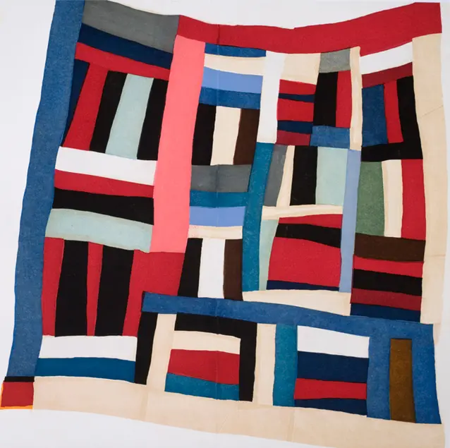 Red, white, blue, and black quilt titled “Remember Me” by Loretta Pettway