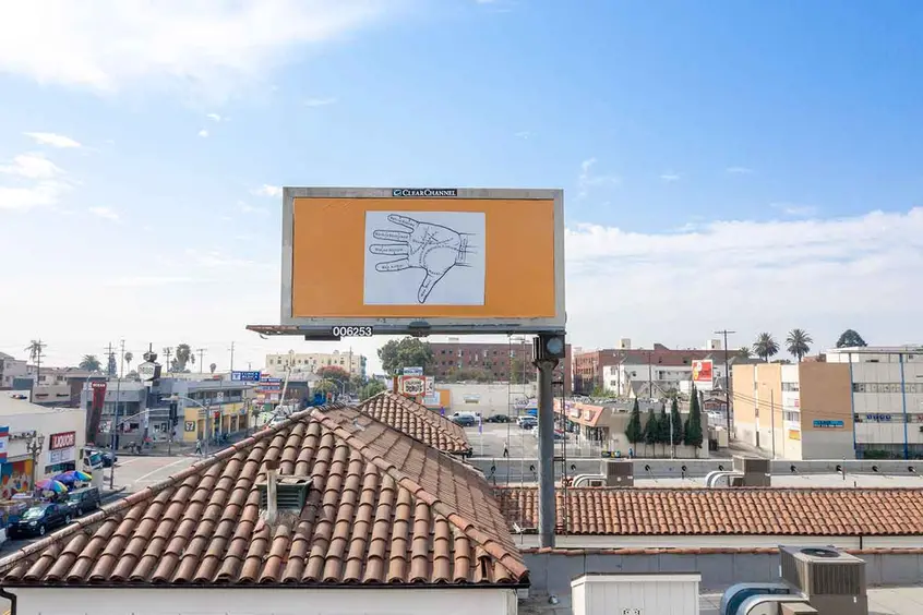 Larry Johnson, Palmistry, 2020. Billboard at West Eighth Street and South Alvarado Street, Los Angeles, 90057 (facing north). 144 × 288 in. (365.8 × 731.5 cm). Courtesy of the artist, David Kordansky Gallery, Los Angeles, and 303 Gallery, New York. Installation view, Made in L.A. 2020: a version. Photo: Joshua White / JWPictures.com