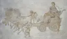 An illustration of a horse-drawn chariot. 