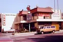 Late 1970s color photo of a storefront. 