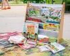 A display of children’s books on a table.