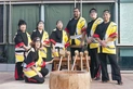 A group of people pose for a photo.