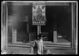 Unknown photographer, Chinese street peddler standing in front of the Lee Kwai Sing shop, Old Chinatown, Los Angeles, ca. 1900. The Huntington Library, Art Museum, and Botanical Gardens.
