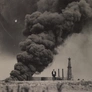 A black and white image of a smoke cloud rising from the ground with a person walking away.