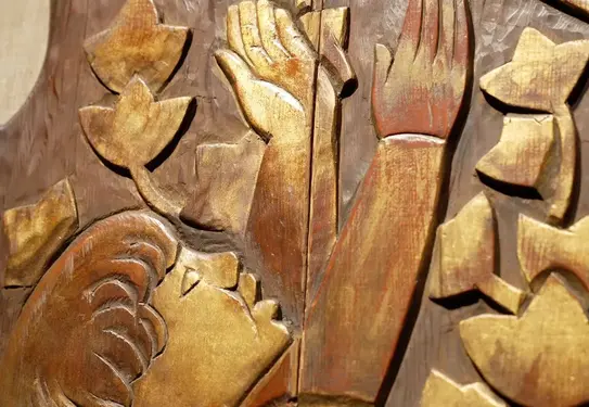 A detail image of a wood carving.