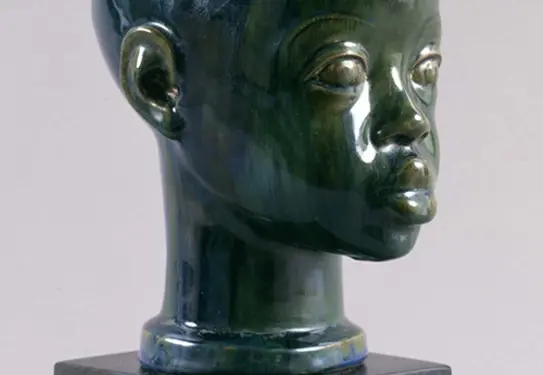 Sargent Claude Johnson sculpture of the head of a boy.