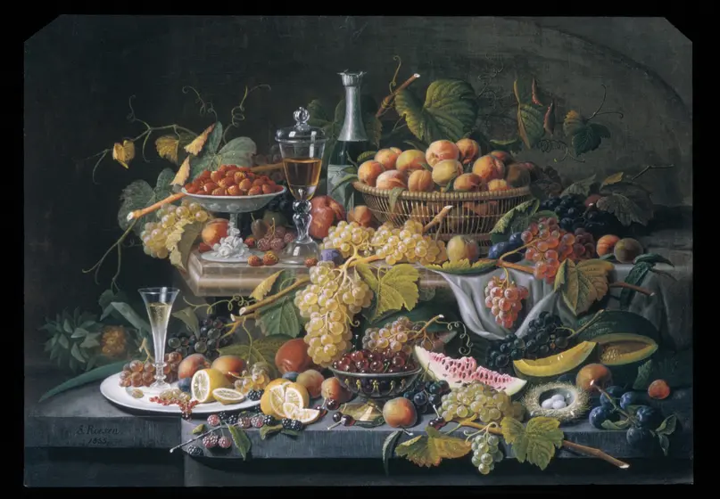Tiered counters with abundance of fruits in bowls and baskets and spilling onto the surfaces.
