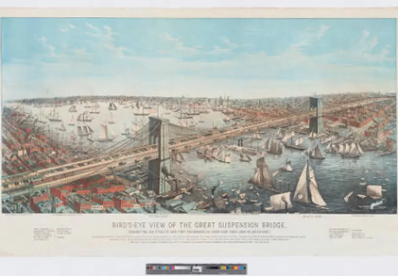 Image of an elevated cityscape view of the Brooklyn Bridge in New York City looking southeast towards Brooklyn and showing the city and boats in the East River.
