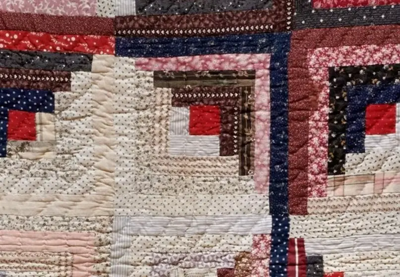 Detail of the Log Cabin Quilt.