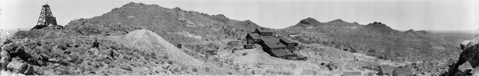 A panoramic photo of a gold mine in the desert.