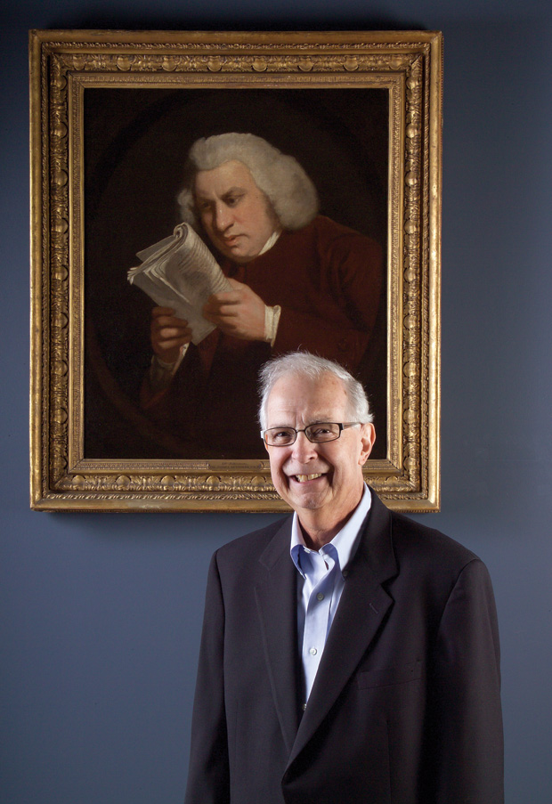 Skip Brack in 2009, standing in front of The Huntington’s painting of “Blinking Sam”