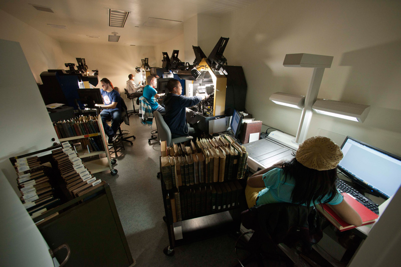 Technicians from Gale Cengage onsite at The Huntington. They are completing the scanning of 5,000 books from The Huntington's collection on the history of science. Photo by John Sullivan, The Huntington Library, Art Collections, and Botanical Gardens.