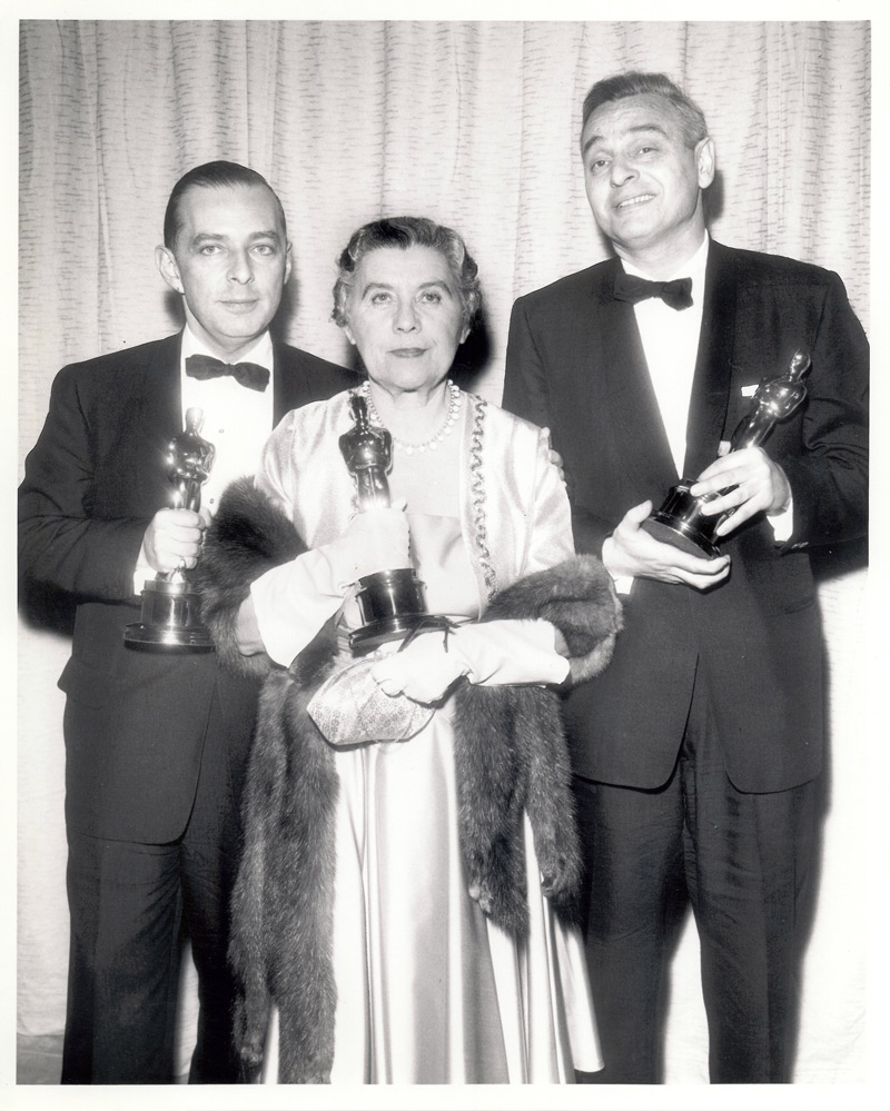 Sonya Levien and William Ludwig (far right) at the 1956 Academy Awards. The man on the left is unidentified.