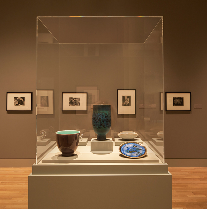 In another new room, photographs by Edward Weston (in background) are accompanied by decorative arts, including Footed Bowl, ca. 1945, by William Manker; Footed Vase, ca. 1967, by Edwin and Mary Scheier; Colemanite Blue, ca. 1965, by Faith Zink Porter; and Folded Bowl, ca. 1960, by Otto and Gertrud Natzler. The Huntington Library, Art Collections, and Botanical Gardens. Photo by Tim Street-Porter.