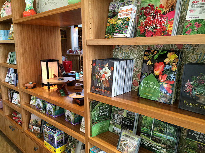 A selection of books and other items in the garden section of the store.