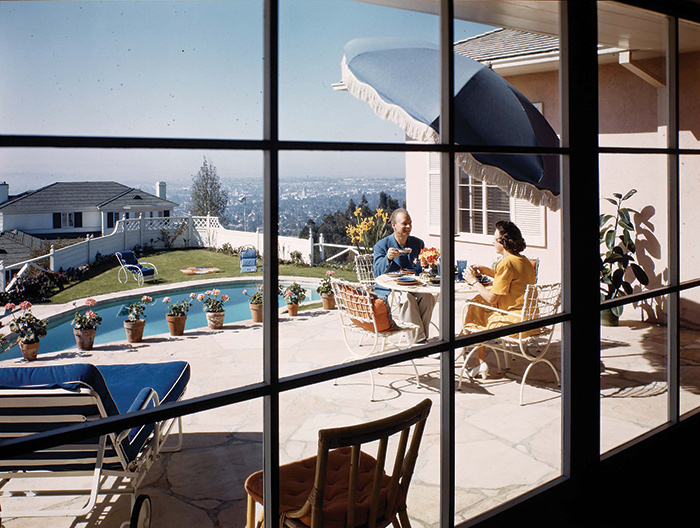 View to patio and swimming pool, Mr. and Mrs. Jack Moss residence, Pacific Palisades, Los Angeles, ca. 1944. Color transparency, 5 x 7 in. The Huntington Library, Art Collections, and Botanical Gardens.
