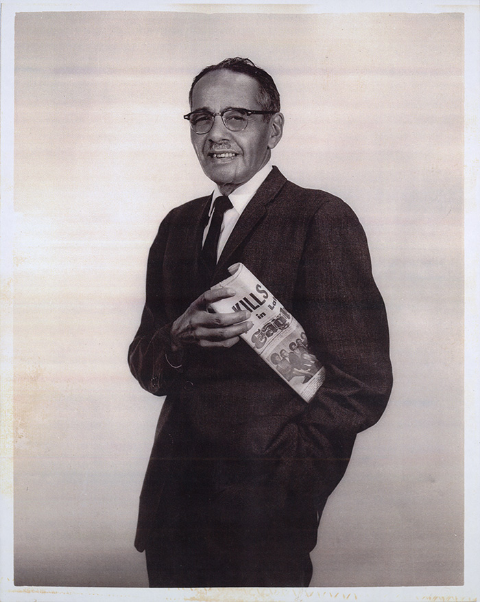 Loren Miller, holding a copy of the California Eagle, 1951. In 1929, Miller came to Los Angeles, where he worked as editor of the California Eagle, the oldest African-American newspaper in the city. He purchased the newspaper in 1951. Langston Hughes Collection. The Huntington Library, Art Collections, and Botanical Gardens.