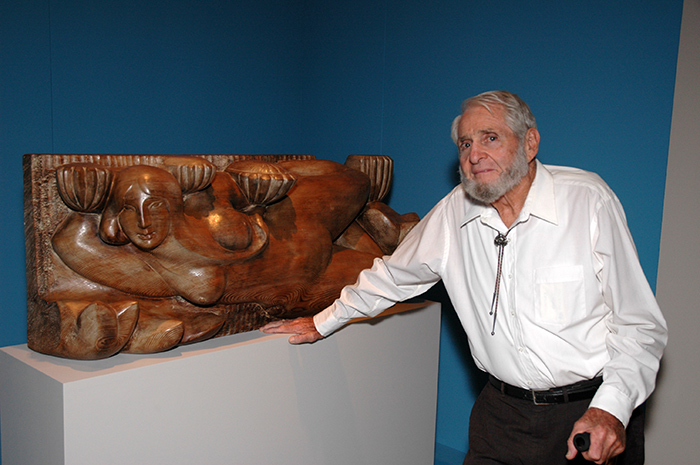 John Svenson with Sea Sprite in the exhibition “The House That Sam Built: Sam Maloof and Art in the Pomona Valley, 1945-1985,” George and MaryLou Boone Gallery, 2012. Photo by Lisa Blackburn.