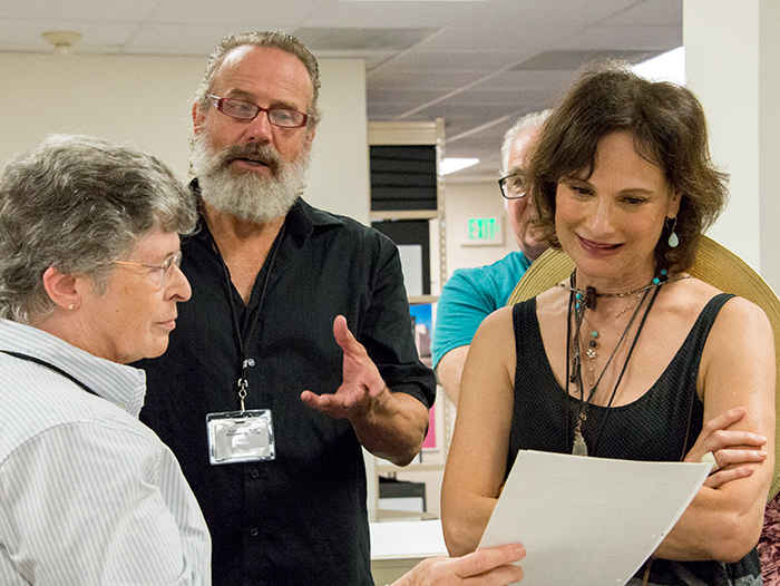 Sara S. “Sue” Hodson, curator of literary manuscripts, shows off an early typed draft of Tom Stoppard’s play Arcadia. Left to right: Sara S. “Sue” Hodson, Geoff Elliott, Mitchell Edmonds, and Susan Angelo. The Huntington Library, Art Collections, and Botanical Gardens. Photo by Kate Lain.